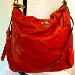 Coach Orange Madison Isabella Hobo with wallet.